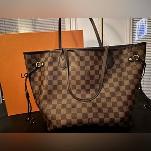 LV never full MM interior stains. Exterior in perfect condition.